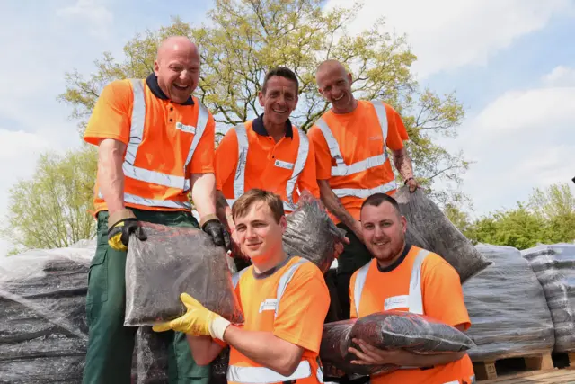 
          Council staff getting ready for last year’s compost giveaway in Goole.
        