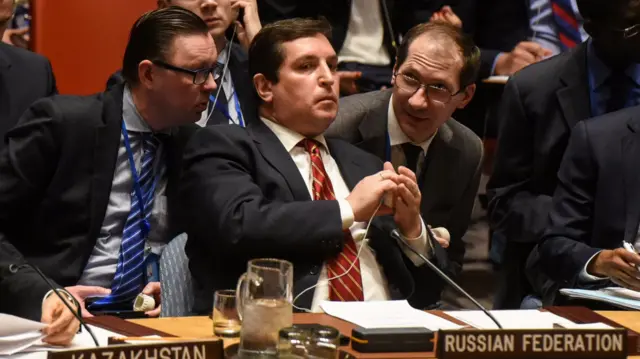 
          Russia"s deputy U.N. envoy, Vladimir Safronkov listens to remarks during the Security Council meeting on the situation in Syria at the United Nations Headquarters, in New York
        