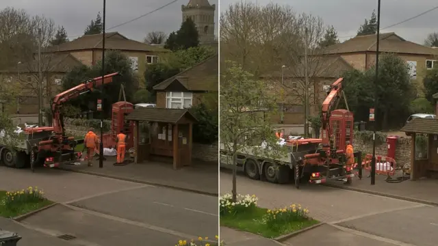 Telephone box being removed