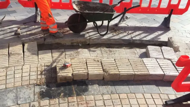 Broken paving being replaced in March