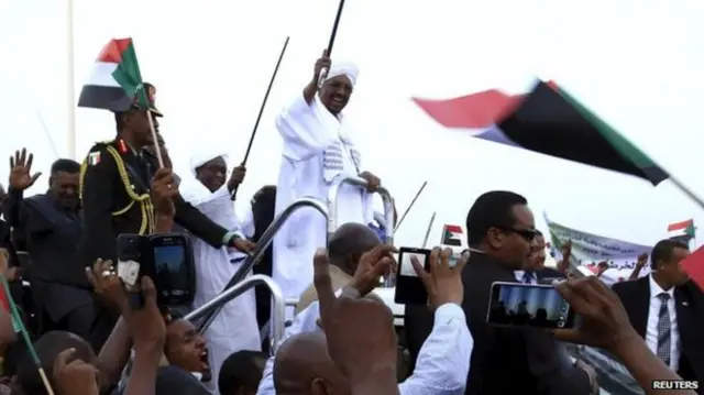 Sudan president met by crowds