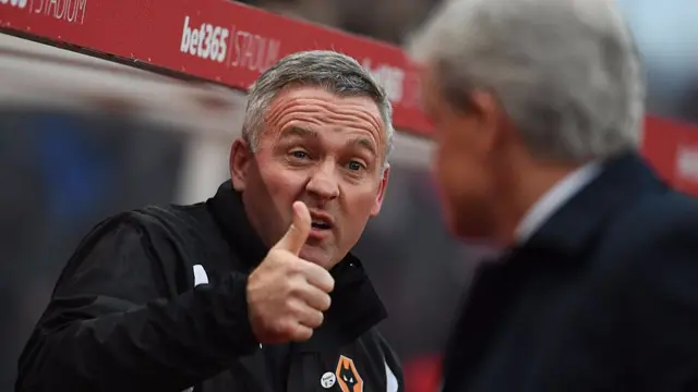 
          Wolverhampton Wanderers manager thumbs up to Stoke City manager Mark Hughes
        