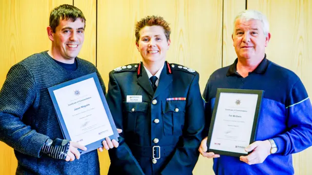 
          Tim McGann (right) with Chief Fire Officer Becci Bryant and Jason Maguire
        