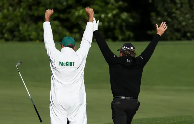 McGirt puts his hands up