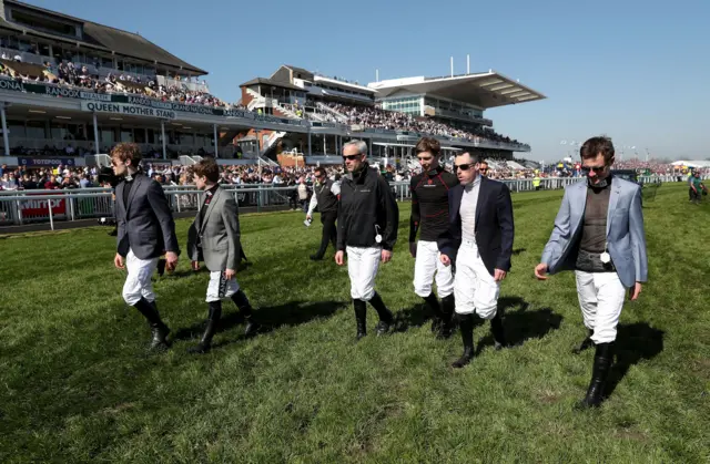 
          Ruby Walsh and some of his fellow jockeys are taking a stroll around the Grand National course. Less than two and half hours to go.
        