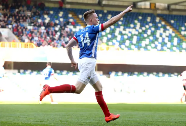 
          Aaron Burns celebrates giving Linfield the lead against Crusaders
        