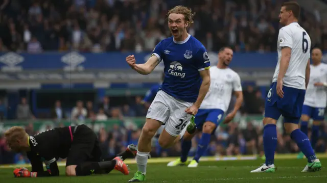 Tom Davies celebrates