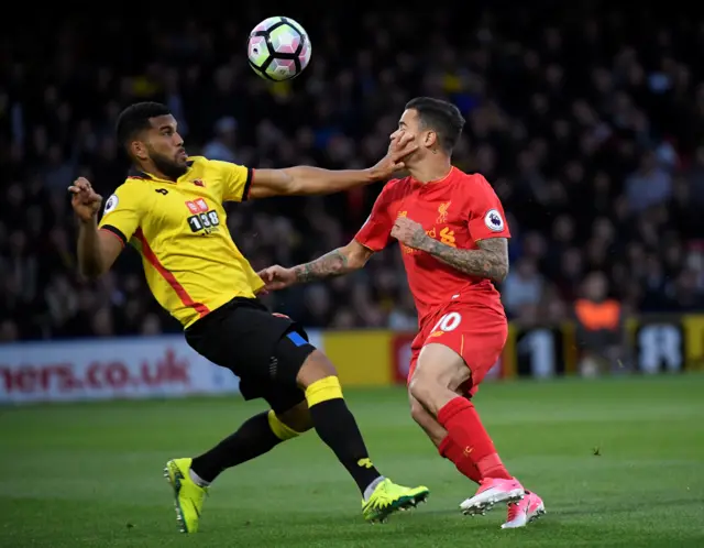 Watford"s Adrian Mariappa in action with Liverpool"s Philippe Coutinho