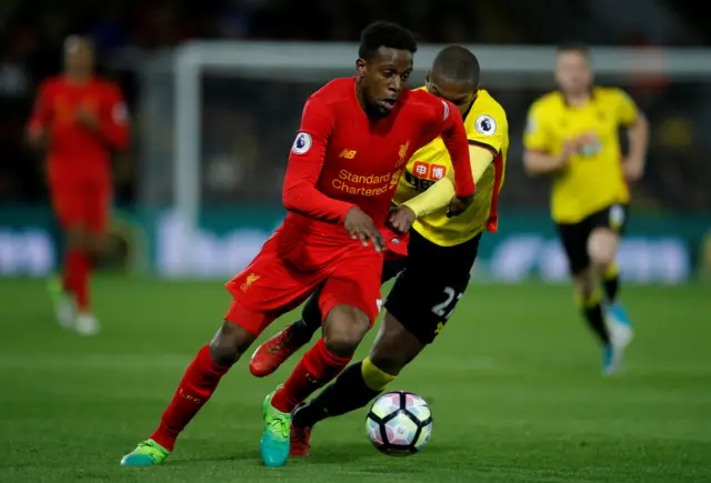 Watford"s Christian Kabasele in action with Liverpool"s Divock Origi