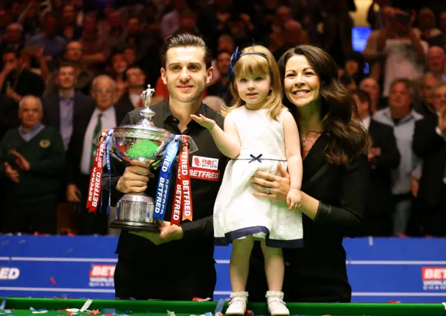 Mark Selby celebrates