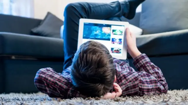 Boy using tablet