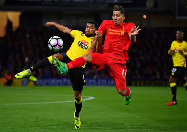 Adrian Mariappa of Watford and Roberto Firmino of Liverpool