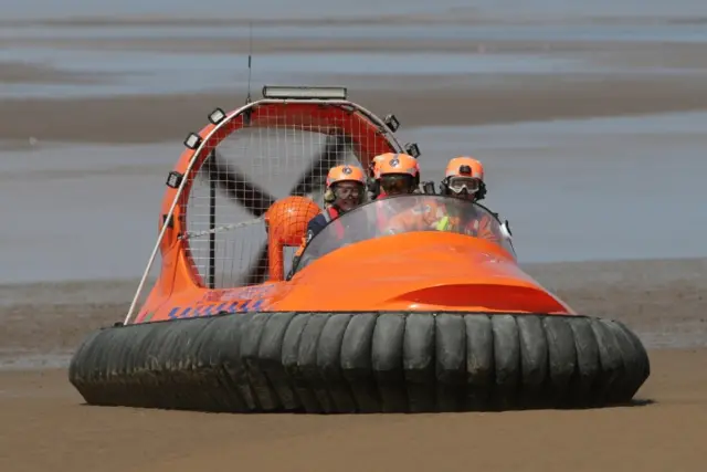 Tim Farron on a hovercraft