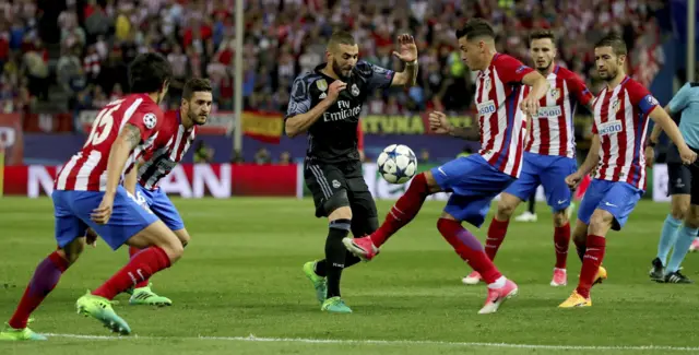 Karim Benzema is tackled