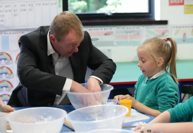 Tim Farron mixing dough