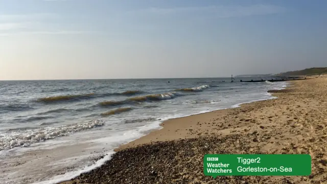 Gentle lapping waves on seashore