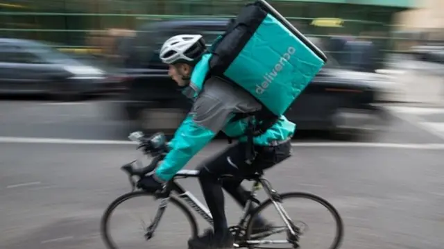 Deliveroo rider on bike