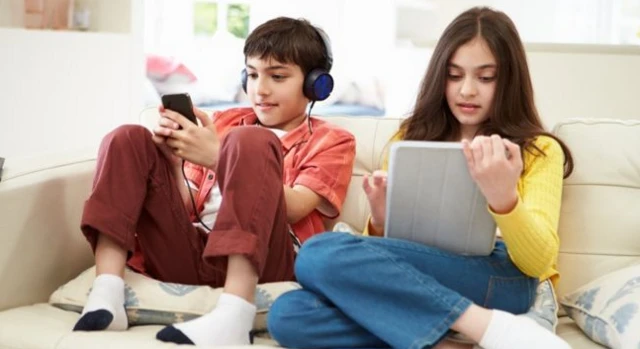 Children using mobile and tablet