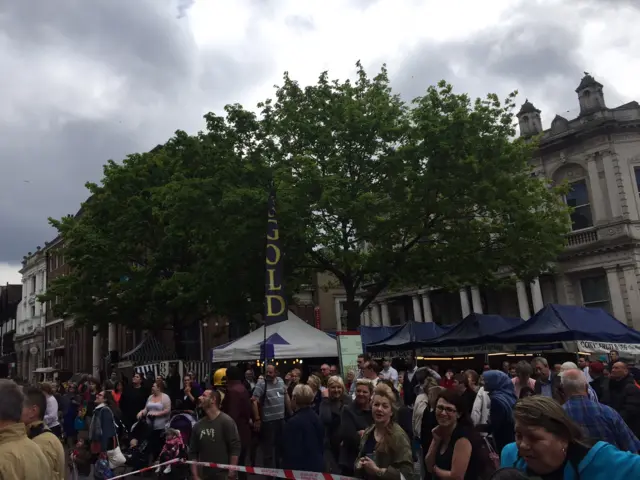 Crowds watch bird of prey rescue on Ipswich's Cornhill