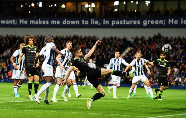 Gary Cahill of Chelsea stretches to get a touch on the ball