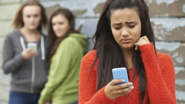 Young people using mobile phones