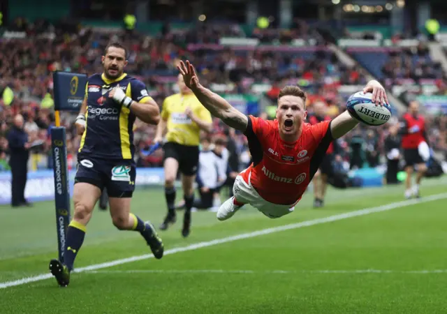 Chris Ashton celebrates scoring a try