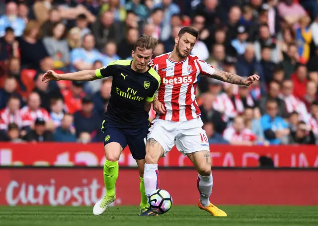 Holding and Arnautovic battle for possesion