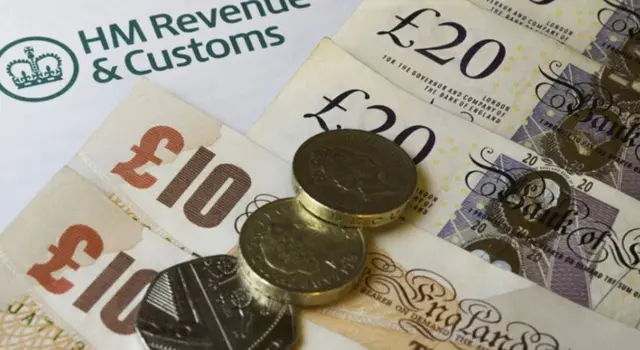 A HMRC (Her Majesty's Revenue and Customs) letter head surrounded by British bank notes and coins