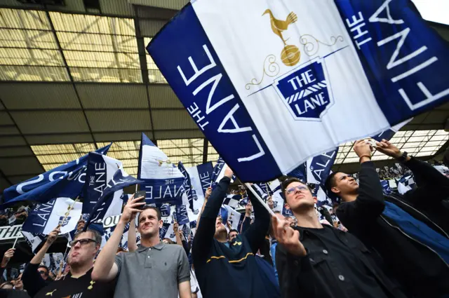 Spurs fans hold The Lane flags