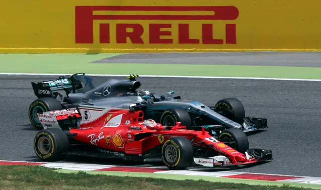 Sebastien Vettel passes Valtteri Bottas