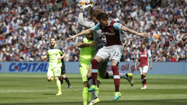 Mignolet clashes with teammate to save ball from Byram