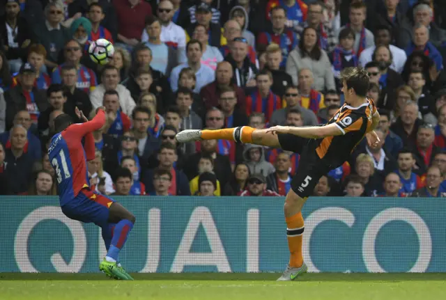 Palace's Schlupp in action with Hull's Maguire