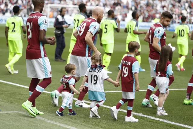 The players come out of the tunnel