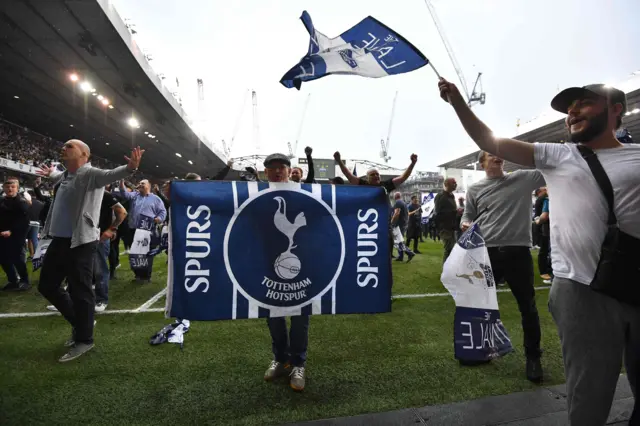 Spurs fan holds flag at White Hart Lane