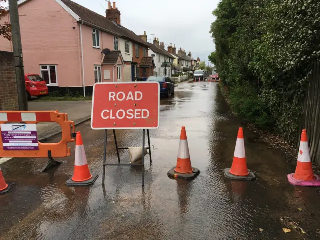 Water main problem floods road in Holbrook