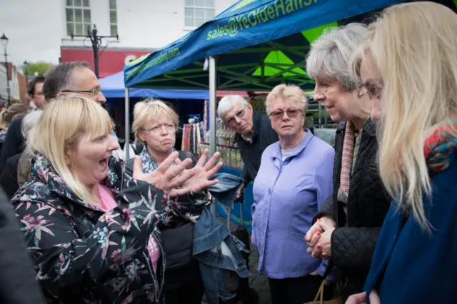 Theresa May and Cathy Mohan