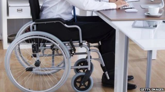 Wheelchair user at work