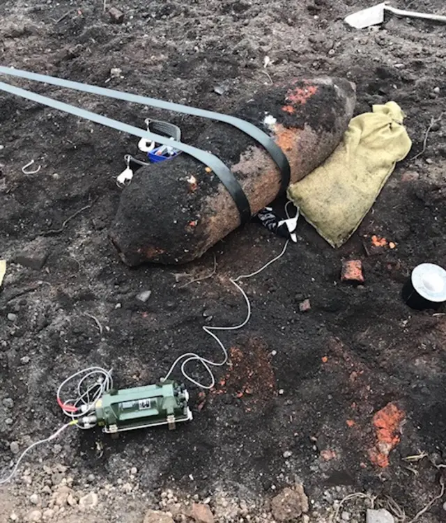 Bomb with army gear attached