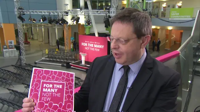 Iain Watson holding the Labour manifesto front page