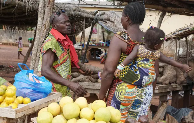 Market stalls reopen as life returns to the streets of a village near Bouake, the country"s second city, following an agreement between the government and mutineers to end clashes over wages in different cities of the country