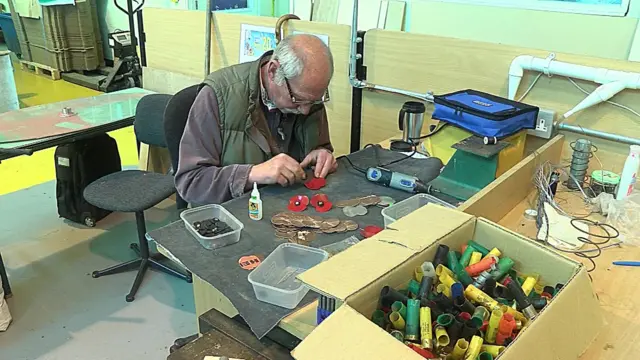 A veteran making poppies