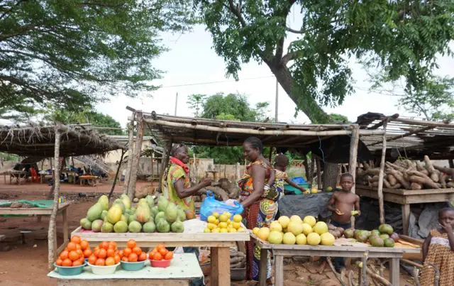 Market stalls reopen as life returns to the streets of a village near Bouake