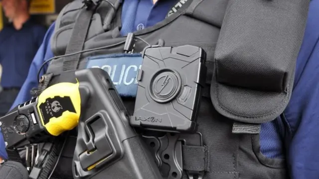 Police officer wearing body-worn video camera