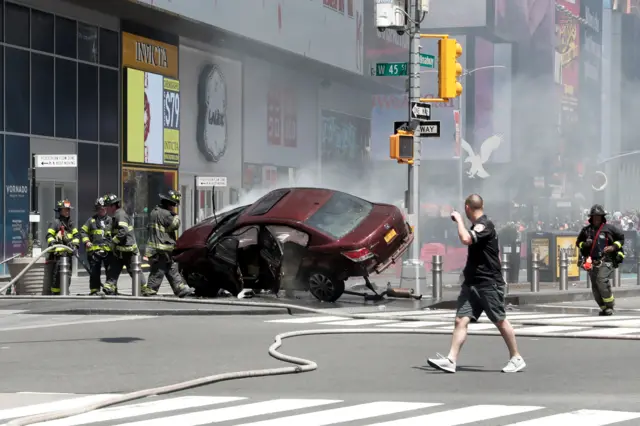 A vehicle that struck pedestrians in Times Square and later crashed is seen on the sidewalk in New York City, U.S., May 18, 2017.