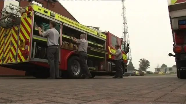 Fire crews at fire engines