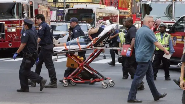 Injured person taken from Times Square