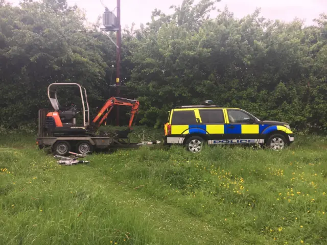 Digger and police car