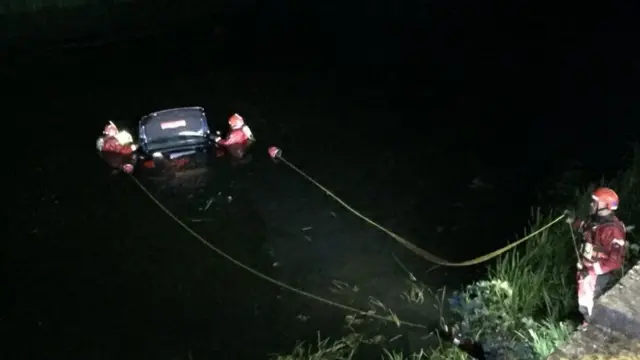 Car in river