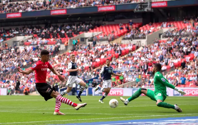 Barnsley striker Ashley Fletcher and Millwall keeper Jordan Archer