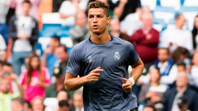 Cristiano Ronaldo warms up